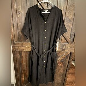 New with tags button up black dress, two front pockets and tie waist